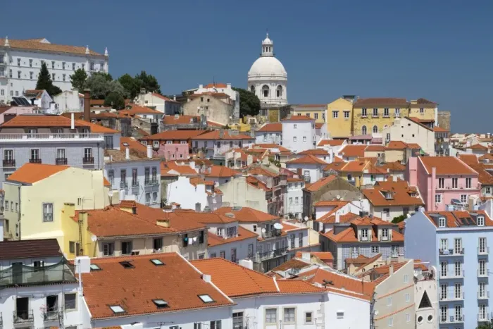 Framed Print : Terracotta roofs and the ancient dome seen from Miradouro Alfama one of the many Framed Print : Terracotta roofs and the ancient dome seen from Miradouro Alfama one of the many
