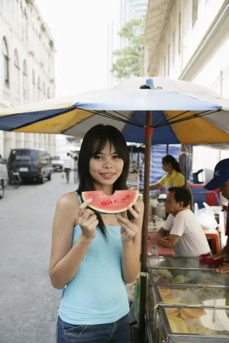 Framed Print : Thai woman with a slice of water melon Framed Print : Thai woman with a slice of water melon