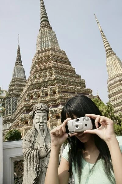 Thai woman taking pictures