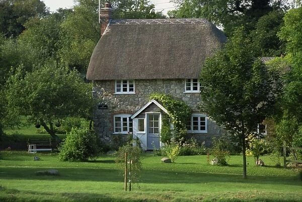 Thatched cottage and garden at Lockeridge in Wiltshire, England, United Kingdom, Europe