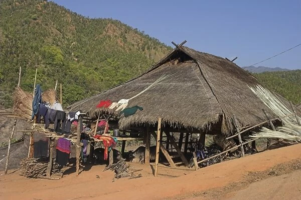 Thatched house with clothes drying, Ann Village, Kengtung (Kyaing Tong)