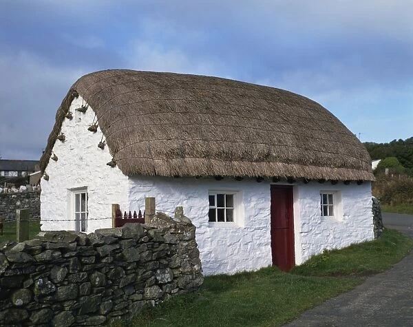 Thatched stone building housing the Cregneash Village Folk Museum on the Isle of Man