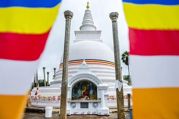 Thuparama Dagoba and the Buddhist flag, Ancient City of Anuradhapura, UNESCO World Heritage Site, Sri Lanka, Asia