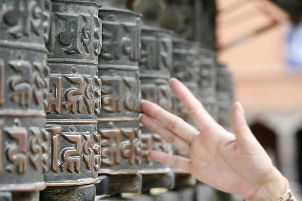 Tibetan prayer wheels, Swayambhunath temple, Kathmandu, Nepal, Asia