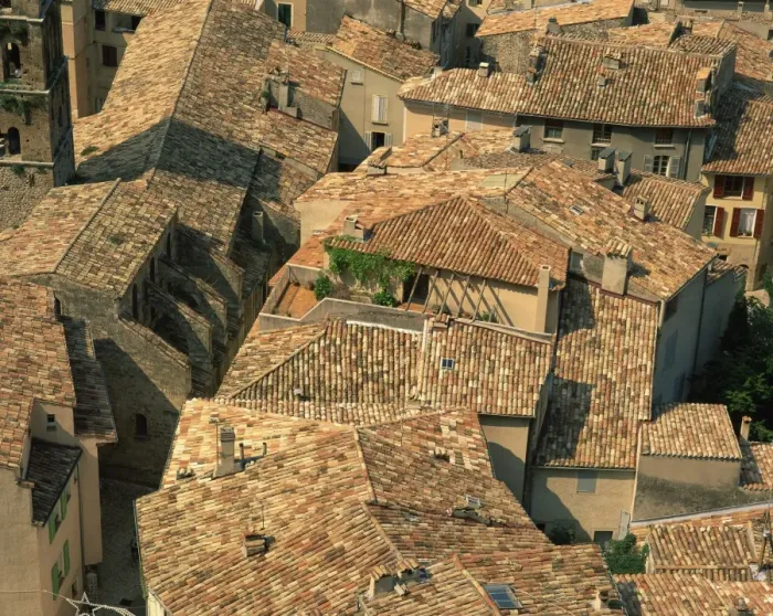 Framed Print : Tiled roofs of houses at Moustiers Ste. Marie, in the Alpes de Haute Provence Framed Print : Tiled roofs of houses at Moustiers Ste. Marie, in the Alpes de Haute Provence