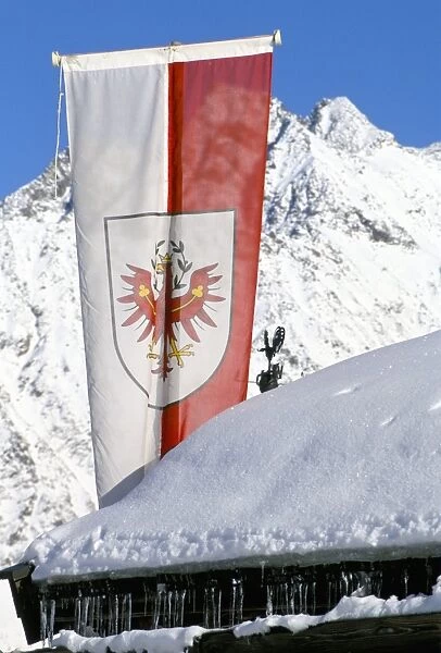 Tirolean flag above village of Solden in Tirol Alps, Solden, Tirol, Austria, Europe