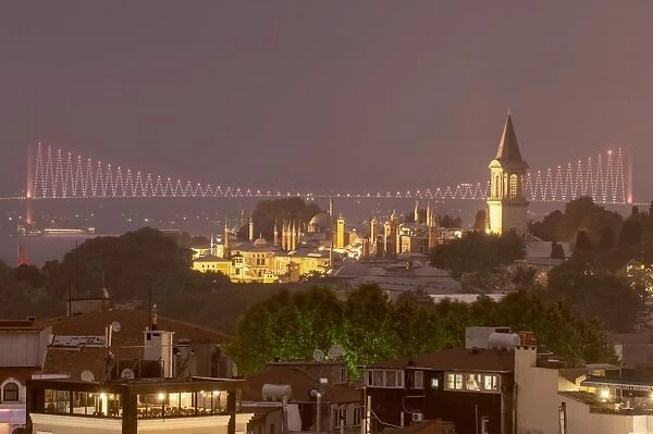 Topkapi Palace and Bosphorus bridge at night, Istanbul, Turkey, Europe