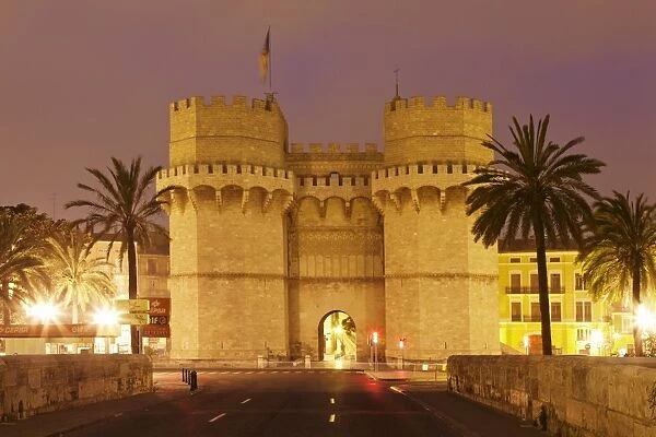 Torres de Serranos city gate at dusk, Valencia, Comunidad Valencia, Spain, Europe