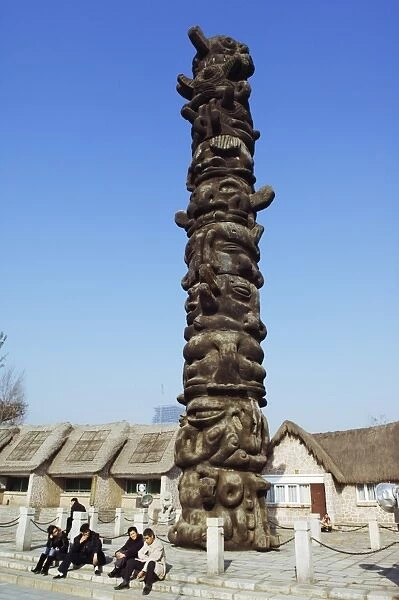 A totem pole at the cultural village in the Olympic Park area, Beijing, China, Asia