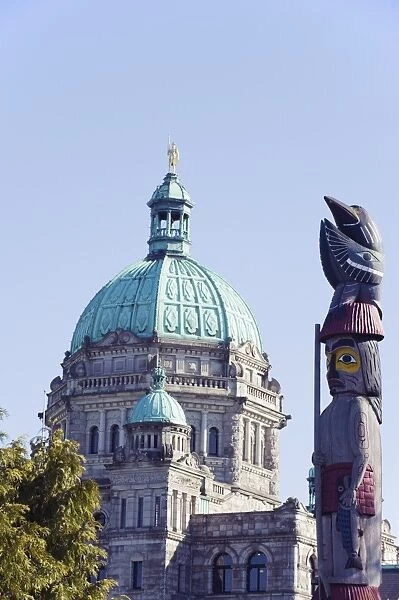 Totem pole in front of the Parliament Buildings, Victoria, Vancouver Island