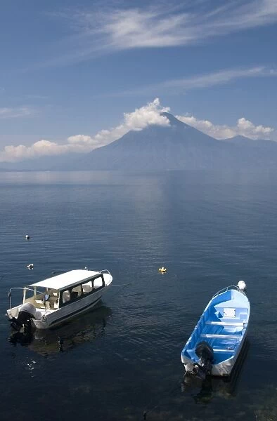 Tour boats anchored near Panajachel, San Pedro Volcano in the background