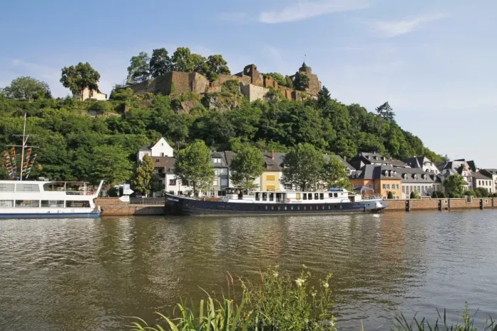Framed Print : Tour Boats with Castle Ruin in Saarburg on Saar River, Rhineland-Palatinate, Germany Framed Print : Tour Boats with Castle Ruin in Saarburg on Saar River, Rhineland-Palatinate, Germany