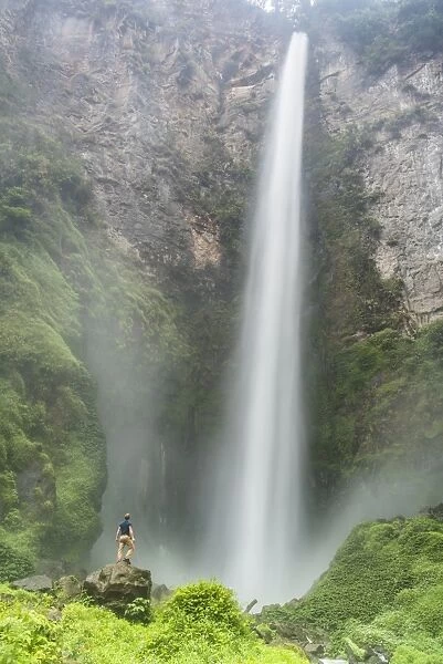 Tourist at 120m Sipisopiso Waterfall, Lake Toba (Danau Toba), North Sumatra, Indonesia