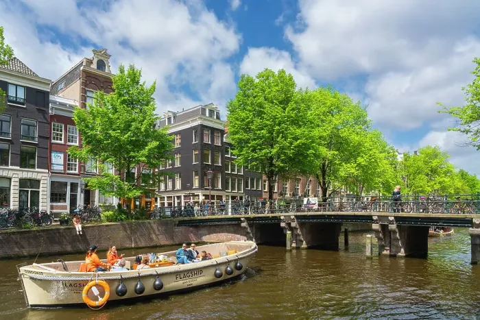 Framed Print : Tourist boat on Herengracht canal, Amsterdam, The Netherlands, Europe Framed Print : Tourist boat on Herengracht canal, Amsterdam, The Netherlands, Europe