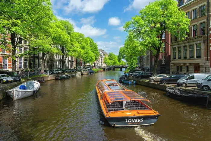 Framed Print : Tourist boat on Herengracht canal, Amsterdam, The Netherlands, Europe Framed Print : Tourist boat on Herengracht canal, Amsterdam, The Netherlands, Europe