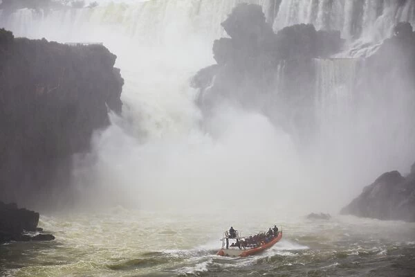 Tourist boat at Iguazu Falls, Iguazu National Park, UNESCO World Heritage Site, Misiones, Argentina, South America