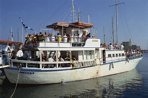 Tourist boat in Mandraki harbour