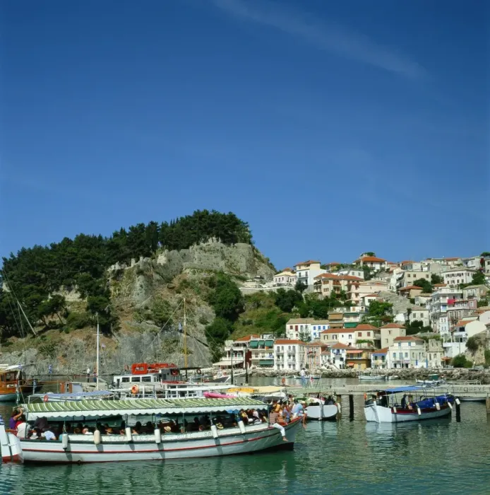 Framed Print : Tourist boats and the town of Parga in the background Framed Print : Tourist boats and the town of Parga in the background