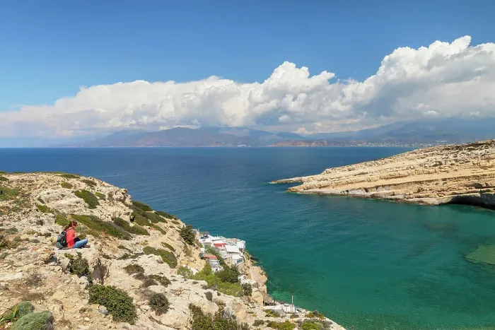 Framed Print : Tourist enjoying the view of the bay of Matala, Iraklion, Crete, Greek Islands, Greece, Europe Framed Print : Tourist enjoying the view of the bay of Matala, Iraklion, Crete, Greek Islands, Greece, Europe
