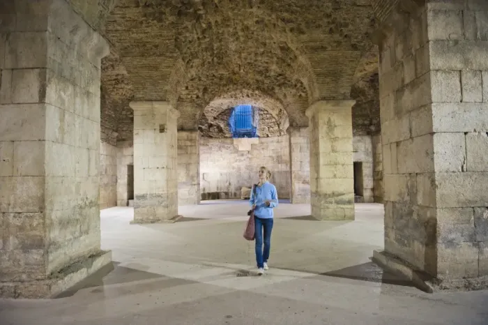 Framed Print : Tourist exploring the underground halls at Diocletians Palace, UNESCO World Heritage Site, Split, Dalmatian Coast, Croatia, Europe Framed Print : Tourist exploring the underground halls at Diocletians Palace, UNESCO World Heritage Site, Split, Dalmatian Coast, Croatia, Europe