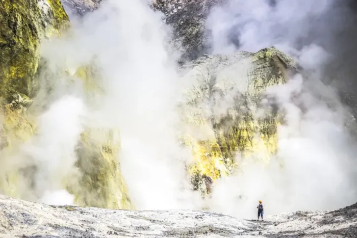 Framed Print : Tourist exploring White Island Volcano, an active volcano in the Bay of Plenty, North Island Framed Print : Tourist exploring White Island Volcano, an active volcano in the Bay of Plenty, North Island