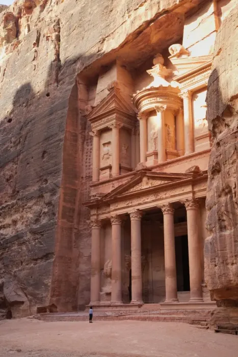 Framed Print : Tourist looking up at the facade of the Treasury (Al Khazneh) carved into the red rock at Petra, UNESCO World Heritage Site, Jordan, Middle East Framed Print : Tourist looking up at the facade of the Treasury (Al Khazneh) carved into the red rock at Petra, UNESCO World Heritage Site, Jordan, Middle East