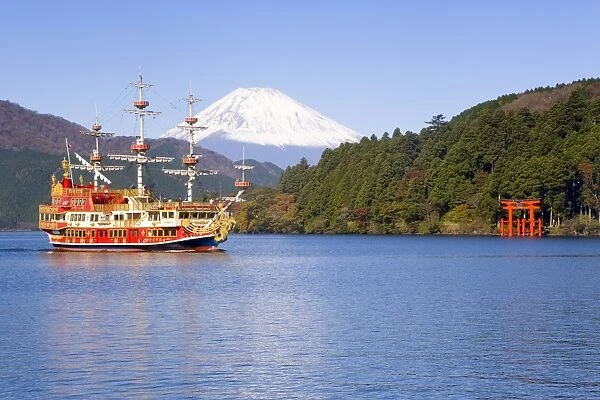 Tourist pleasure boat on lake Ashino-ko with the red