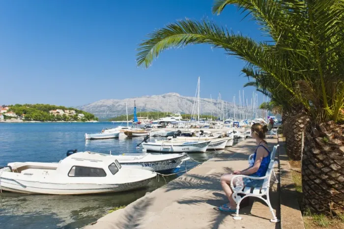 Framed Print : Tourist sitting in Lumbarda Harbor, Korcula Island, Dalmatian Coast, Adriatic, Croatia, Europe Framed Print : Tourist sitting in Lumbarda Harbor, Korcula Island, Dalmatian Coast, Adriatic, Croatia, Europe