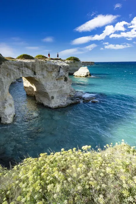 Framed Print : Tourists admiring the sea from natural stone arch on cliff, Torre Sant Andrea Framed Print : Tourists admiring the sea from natural stone arch on cliff, Torre Sant Andrea