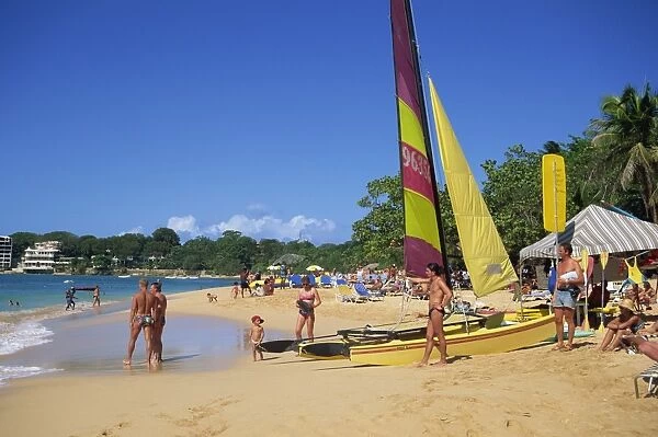 Tourists on the beach at Sosua, Dominican Republic, West Indies, Caribbean