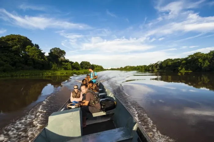 Framed Print : Tourists on a boat searching for animals in the Pantanal, UNESCO World Heritage Site, Brazil, South America Framed Print : Tourists on a boat searching for animals in the Pantanal, UNESCO World Heritage Site, Brazil, South America