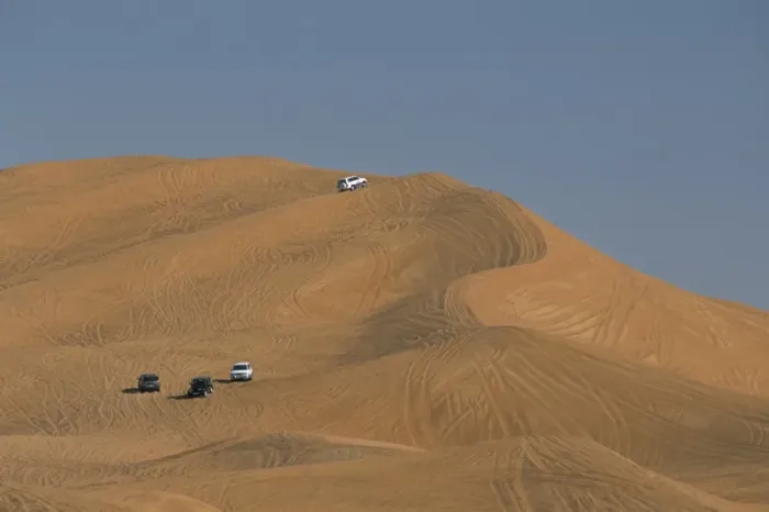 Framed Print : Tourists dune-bashing in 4 wheel drive vehicles in Framed Print : Tourists dune-bashing in 4 wheel drive vehicles in