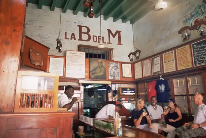 Framed Print : Tourists enjoy mojitos at the Bodegita del Medio, one of Havanas oldest bars Framed Print : Tourists enjoy mojitos at the Bodegita del Medio, one of Havanas oldest bars