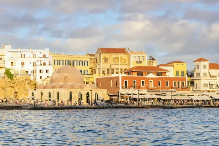 Framed Print : Tourists enjoying sunset at the old Venetian port of Chania, Crete, Greek Islands, Greece Framed Print : Tourists enjoying sunset at the old Venetian port of Chania, Crete, Greek Islands, Greece