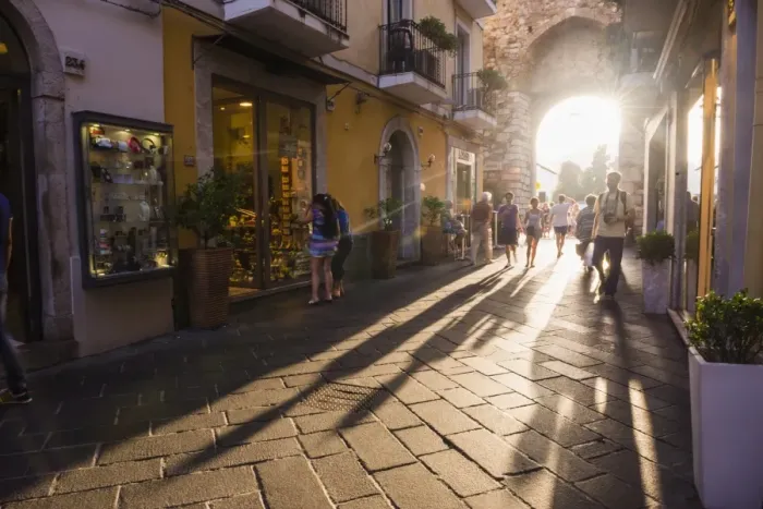Framed Print : Tourists entering Corso Umberto, the main street in Taormina at sunset, Sicily, Italy, Europe Framed Print : Tourists entering Corso Umberto, the main street in Taormina at sunset, Sicily, Italy, Europe