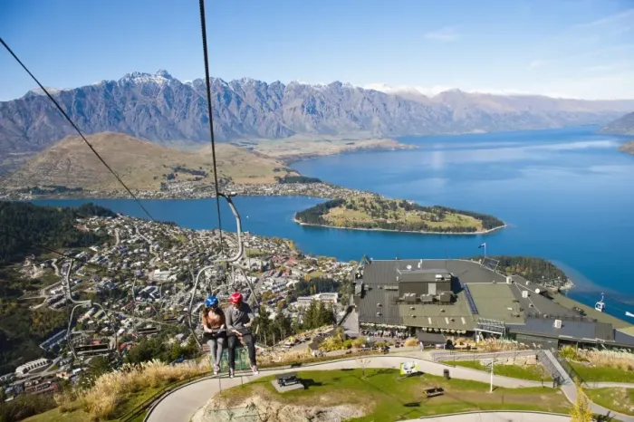 Framed Print : Two tourists on the gondola to the luge track above Queenstown, Otago, South Island, New Zealand, Pacific Framed Print : Two tourists on the gondola to the luge track above Queenstown, Otago, South Island, New Zealand, Pacific