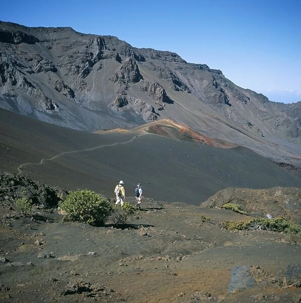 Tourists hiking inside Haleakala Crater