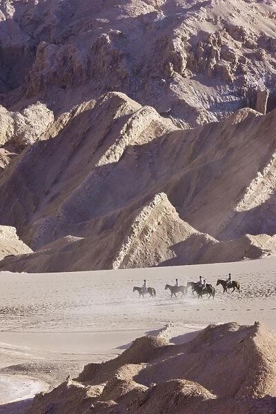 Tourists horse trekking, Valle de la Luna (Valley of the Moon), Atacama Desert