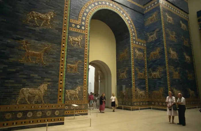 Framed Print : Tourists listen to recorded description of Ishtar Gate, Babylonian dating from the 6th century BC Framed Print : Tourists listen to recorded description of Ishtar Gate, Babylonian dating from the 6th century BC