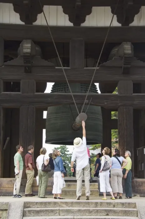 Framed Print : Tourists look at big cast iron bell Framed Print : Tourists look at big cast iron bell