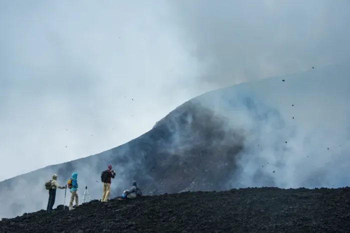 Framed Print : Tourists looking at an active lava eruption on the Tolbachik volcano, Kamchatka, Russia, Eurasia Framed Print : Tourists looking at an active lava eruption on the Tolbachik volcano, Kamchatka, Russia, Eurasia