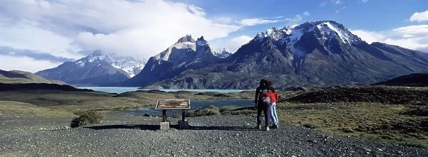 Tourists looking towards the Cuernos del Paine mountains, Torres del Paine National Park