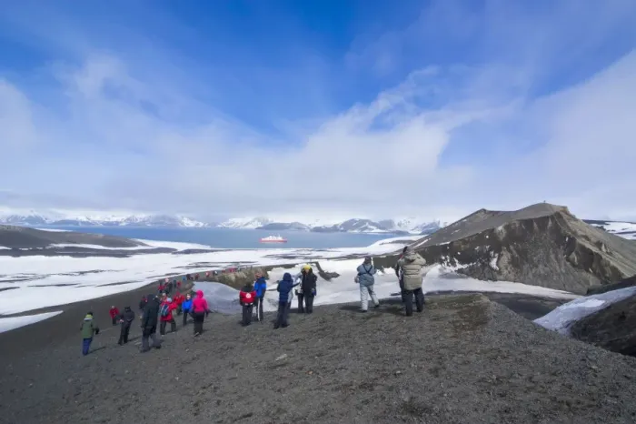 Framed Print : Tourists looking at the Volcano crater at Deception Island, South Shetland Islands, Antarctica, Polar Regions Framed Print : Tourists looking at the Volcano crater at Deception Island, South Shetland Islands, Antarctica, Polar Regions