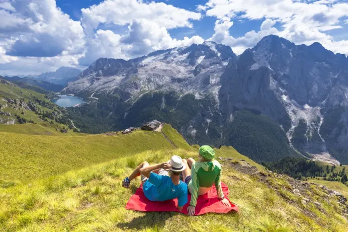 Framed Print : Tourists looks Viel del Pan Refuge with Marmolada in the background. Pordoi Pass Framed Print : Tourists looks Viel del Pan Refuge with Marmolada in the background. Pordoi Pass