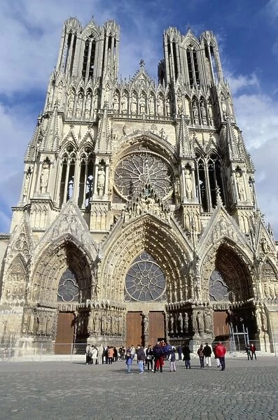Tourists outside Reims cathedral, dating from 13th and 14th centuries, UNESCO World Heritage Site