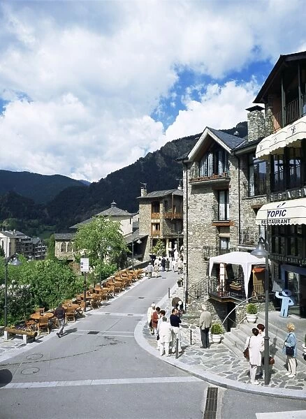 Tourists on pedestrianised street in old part of town, Ordino, Andorra, Europe