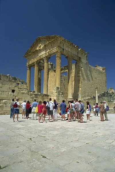 Tourists at the Roman ruins, the Capitol, Dougga, UNESCO World Heritage Site