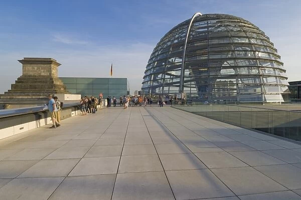 Tourists on the roof terrace of the famous Reichstag Parliament Building reconstructed by architect Sir Norman Foster between 1994 and 1999 with its famous glass cupola, Berlin