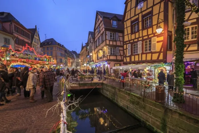 Framed Print : Tourists shopping at the Christmas Markets in the old medieval town of Colmar, Haut-Rhin department Framed Print : Tourists shopping at the Christmas Markets in the old medieval town of Colmar, Haut-Rhin department