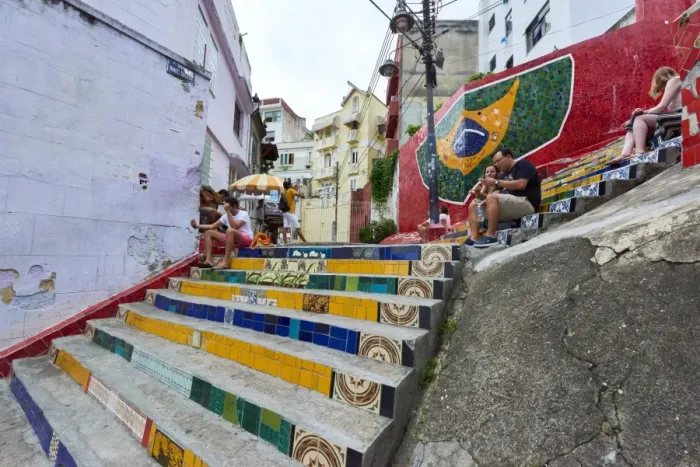 Framed Print : Tourists sitting on Selaron Steps, 215 decorated steps the work of artist Jorge Selaron Framed Print : Tourists sitting on Selaron Steps, 215 decorated steps the work of artist Jorge Selaron